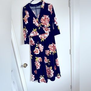 Black floral dress, white floral dress